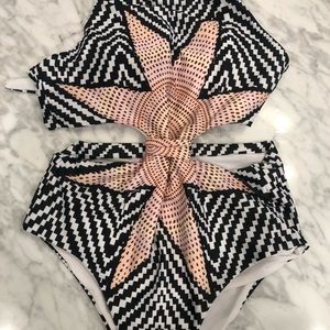 Women’s halter one piece with side cut outs